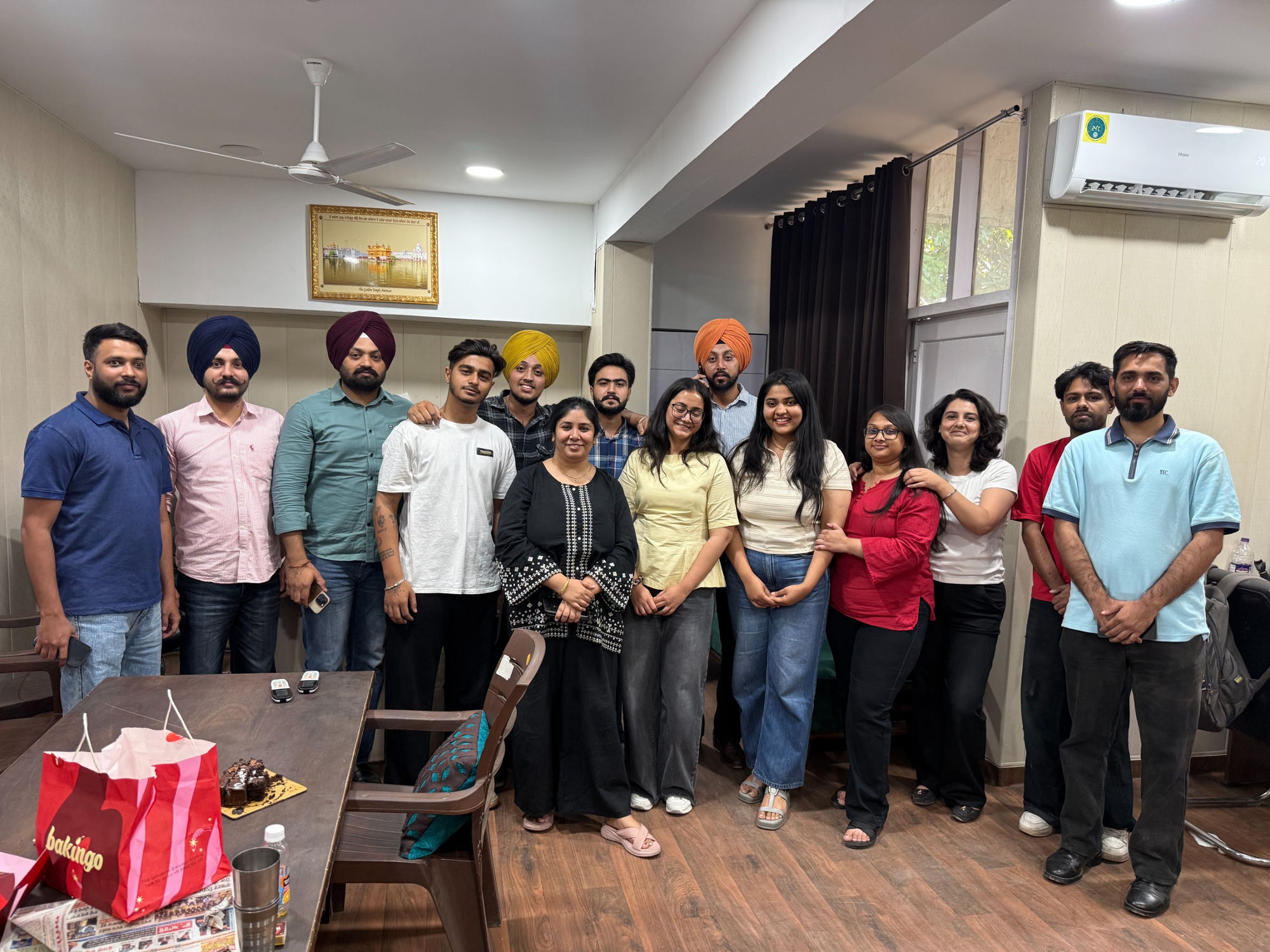 The Yellow Straw team together at the office